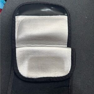New in bag. Pair of black arm bands that heat to encourage sweat.